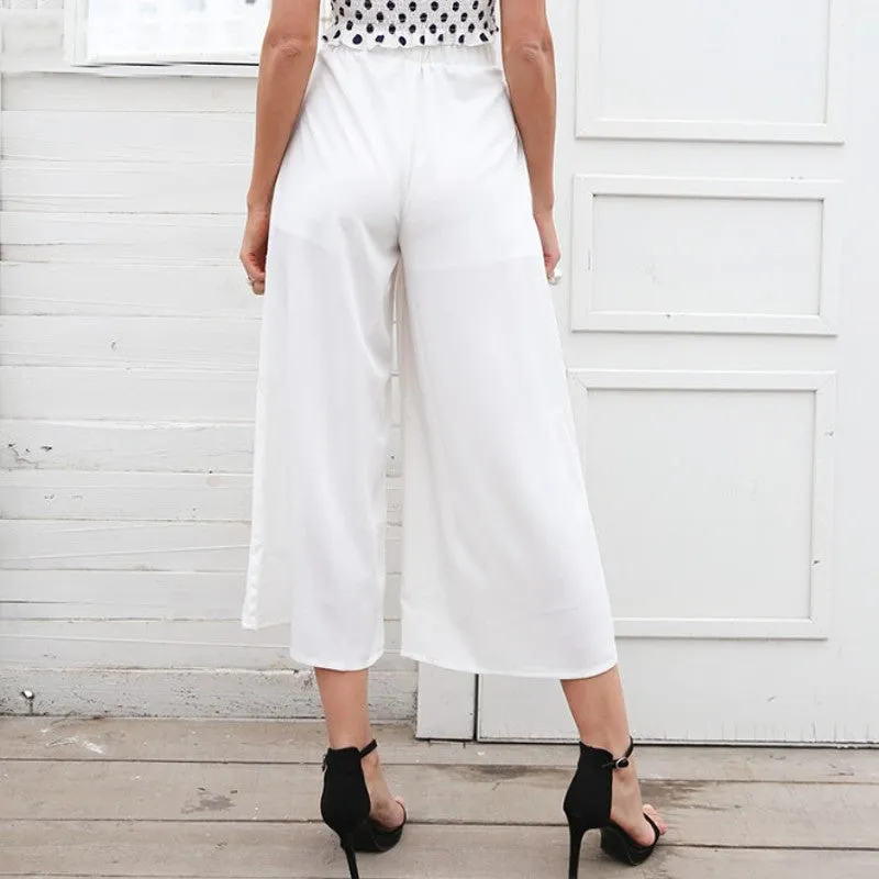 Pantalon coupe évasée - Mi-mollet Taille haute froncée - Oeillets et nœud en rosette