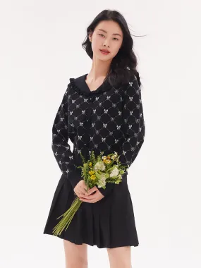 Pull tricoté en jacquard noir et blanc